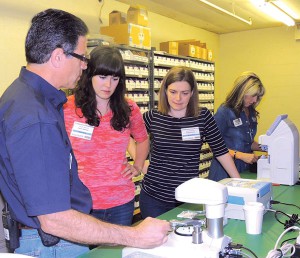 Medical volunteers review the eyewear equipment at Coachella Valley Expedition