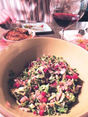 Shaved Brussels sprout salad with pomegranate, hazelnuts, and pecorino cheese