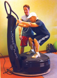 Jay Nixon works with Vicky Harrison on the Power Plate