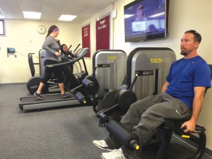 Faculty and staff work out in the new center