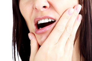 TMJ can cause pain in the jaw, neck, back and through the body.