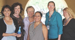 From left to right: Eugenia Torres, Tami Scott, Sly Zelnys, Ann Marie Quintanilla, Samantha Hawley, Cindy Hansen. Represented by the “GCC Spirit Award” held by Eugenia is Josie Meza